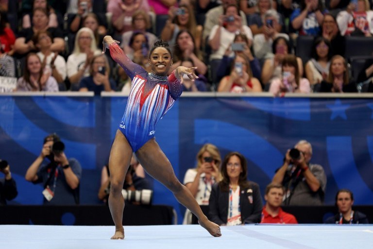 Simone Biles books Paris Olympics berth with US gymnastics trials all